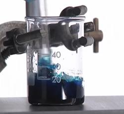An image of a chemical flask containing ionic liquid