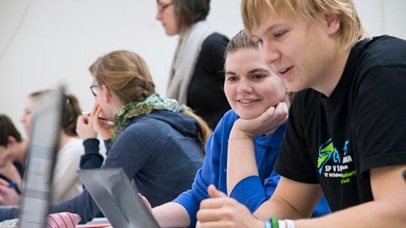 Students working on a computer together